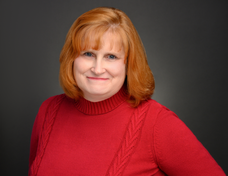 Carrie Arnold, Receptionist